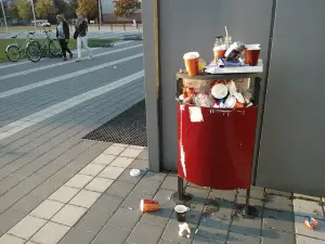 Waste collection bin picture showing over flow of waste